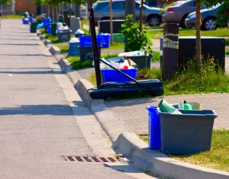 Residents disposing of furniture at a Richmond recycling center